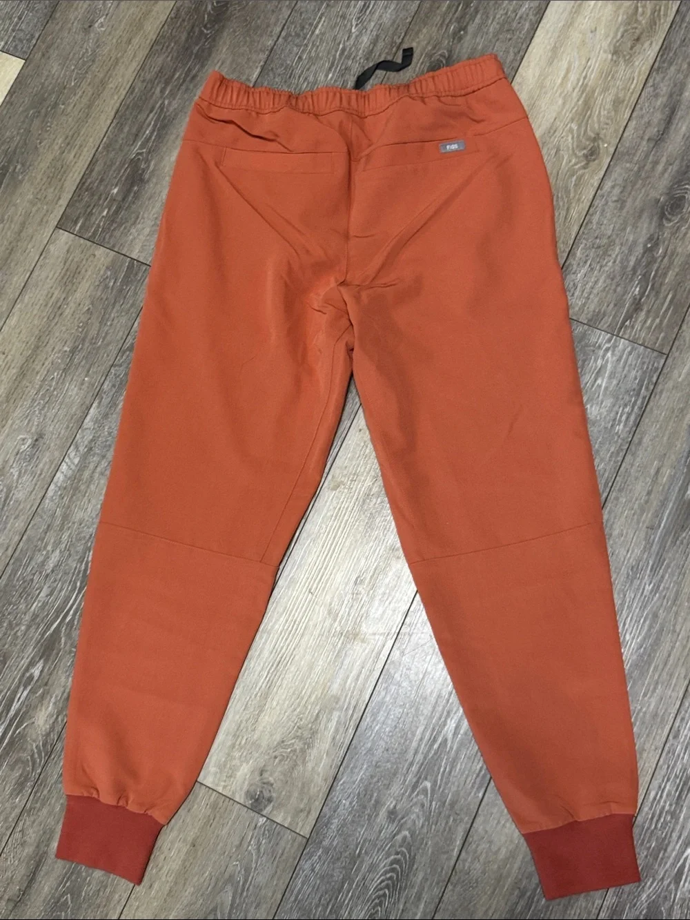 Figs Men's Burnt Orange Jogger style scrub pants with Black Drawstring